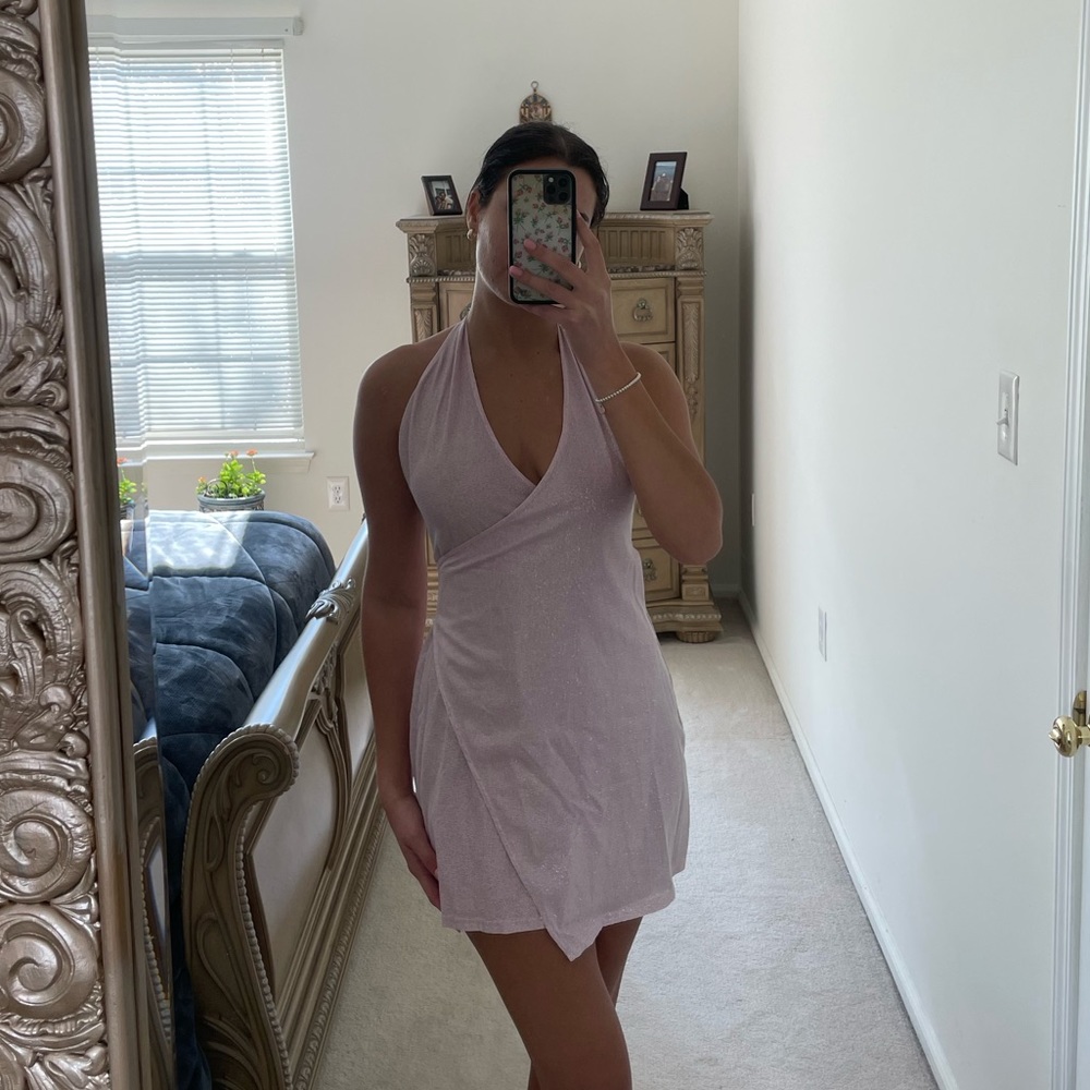 The perfect party dress! Super cute pink sparkly mini dress.